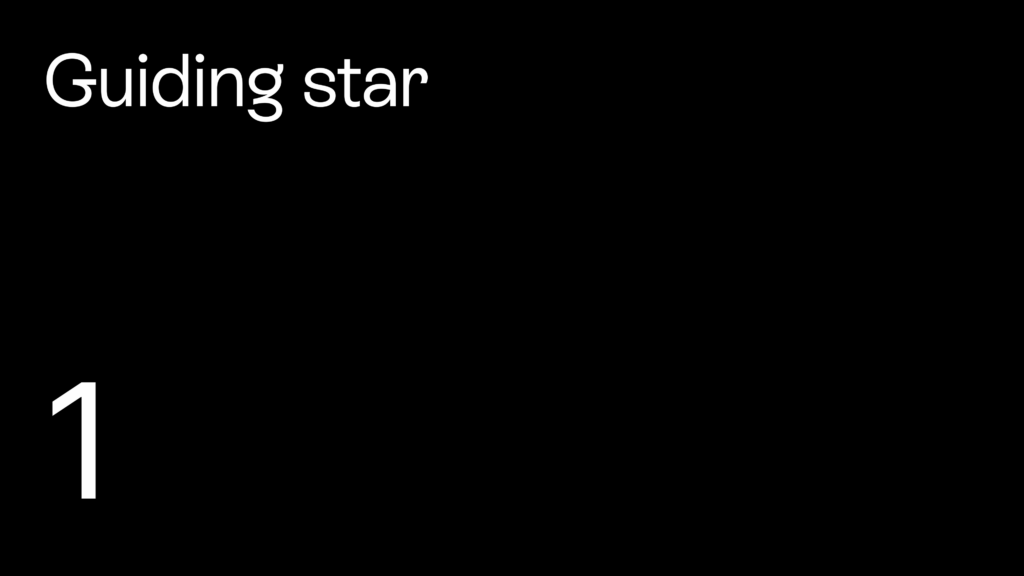 Black title slide with white handwritten-style text reading "Guiding star" in the upper left and a large white number 1 in the lower left.