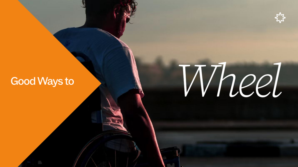 Promotional image for wheelchair routes: a person in a wheelchair seen from behind at sunset, with an orange arrow panel on the left reading "Good Ways to" and large white text on the right reading "Wheel". A small Good Ways star icon appears in the top right.